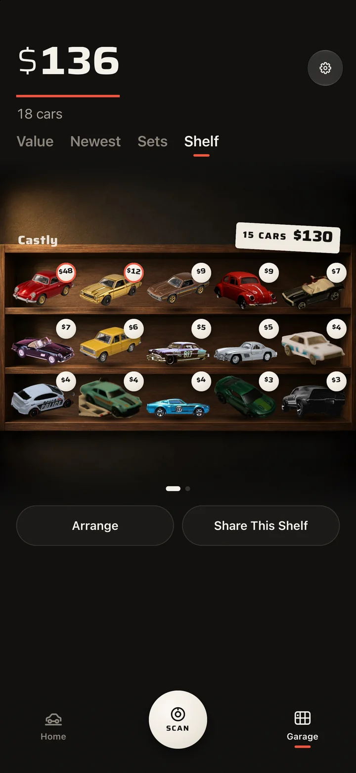 The Shelf in Castly: fifteen cars cut out of their photos, standing on wooden shelves.